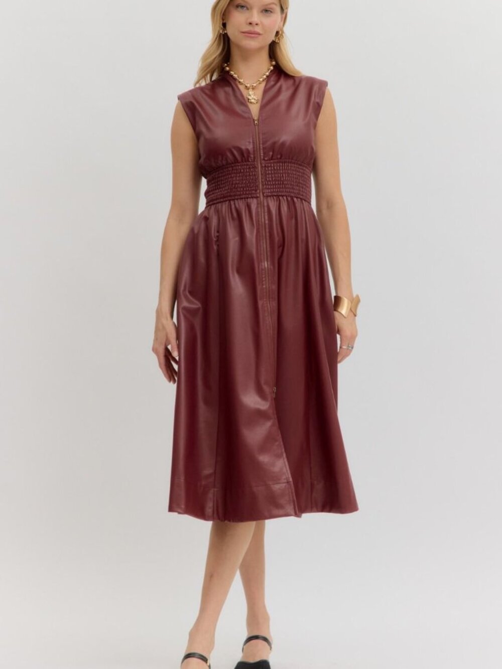 P U Leather Zip up short sleeve Midi dress with pockets.